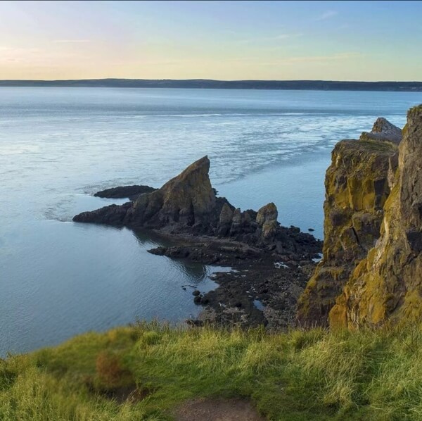 View from Cape Split cliffs overlooking the Bay of Fundy coastline in Nova Scotia