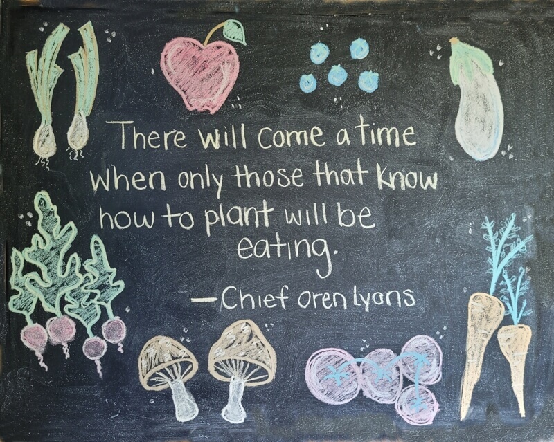 Quote about gardening and local food displayed at The Flying Apron Cookery in Summerville Nova Scotia