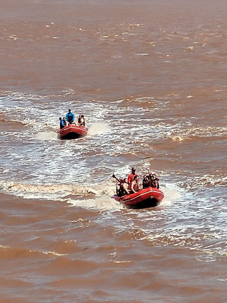 Zodiac boat on the Shubenacadie River during the Fundy tidal bore
