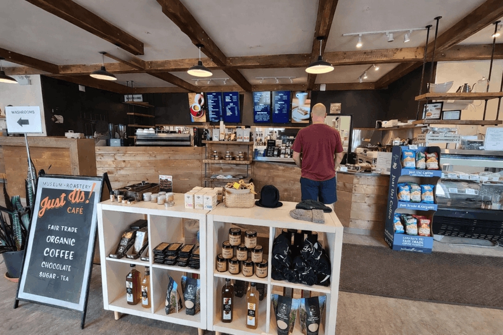 Interior of Just Us! Grand Pré Café and Roastery, a popular coffee stop before the Cape Split hike in Nova Scotia