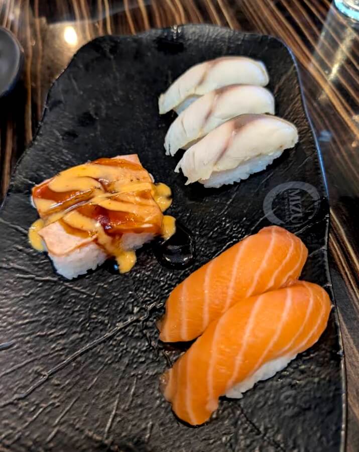 Salmon nigiri and assorted sushi at Mizu All You Can Eat in Halifax.