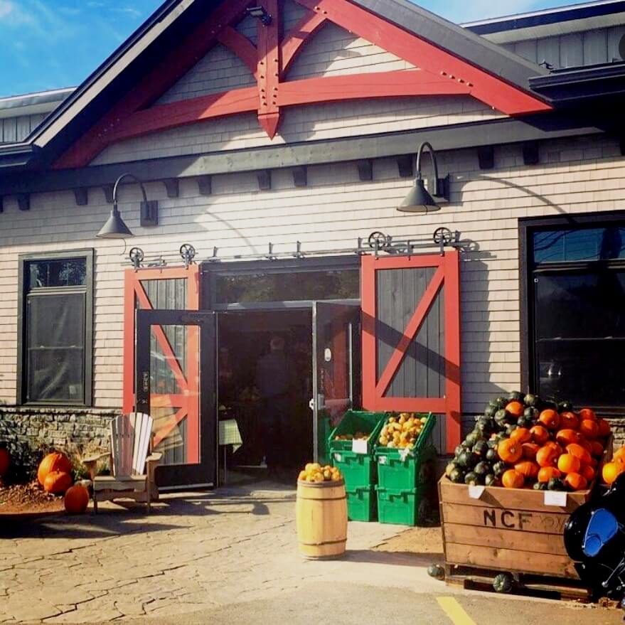 Entrance to Noggins Corner Farm Market with pumpkins and produce in the Annapolis Valley, Nova Scotia